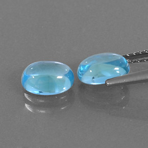 Gemas de topacio azul natural de  ct, corte óvalo, transparente