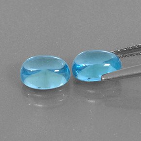 Gemas de topacio azul natural de  ct, corte óvalo, transparente