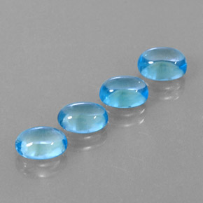 Gemas de topacio azul natural de  ct, corte óvalo, transparente