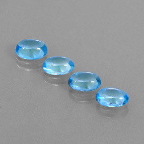 Gemas de topacio azul natural de  ct, corte óvalo, transparente