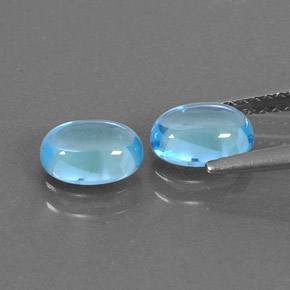 Gemas de topacio azul natural de  ct, corte óvalo, transparente