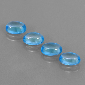 Gemas de topacio azul natural de  ct, corte óvalo, transparente