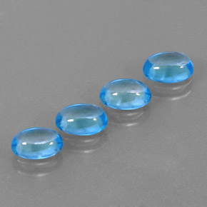 Gemas de topacio azul natural de  ct, corte óvalo, transparente