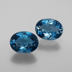 Gemas de topacio azul natural de  ct, corte óvalo, VS