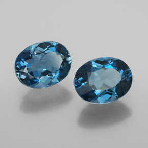 Gemas de topacio azul natural de  ct, corte óvalo, VS