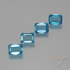7.74ctw Natural Azul Suizo Topacio, corte esmeralda, VS