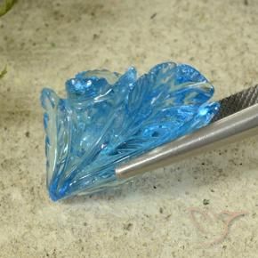 Topacio Azul Suizo natural de 23.87 ct, Corte Flor, Transparente