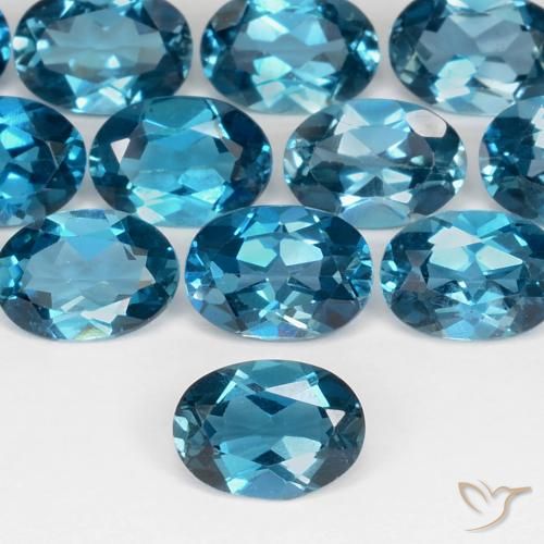 0.92ct Natural Azul Londres Topacio, Ovalada, VS