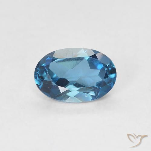 0.60ct Natural Azul Londres Topacio, Ovalada, VVS