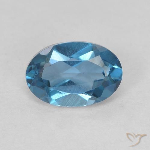 0.56ct Natural Azul Londres Topacio, Ovalada, VVS-VS
