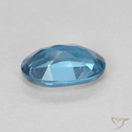 Topacio Azul Londres natural de 0.56 ct, Ovalada, VVS-VS