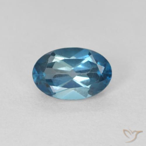 0.62ct Natural Azul Londres Topacio, Ovalada, VVS