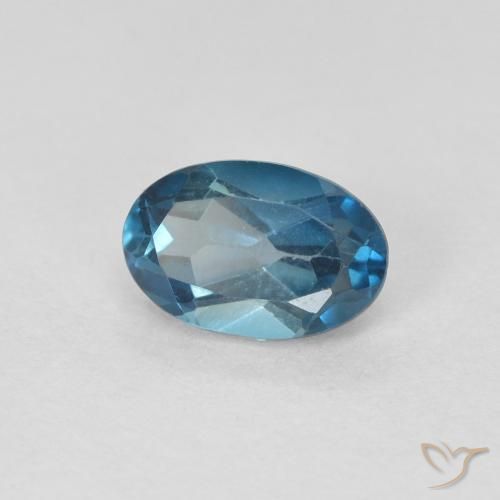 Topacio Azul Londres natural de 0.62 ct, Ovalada, VVS