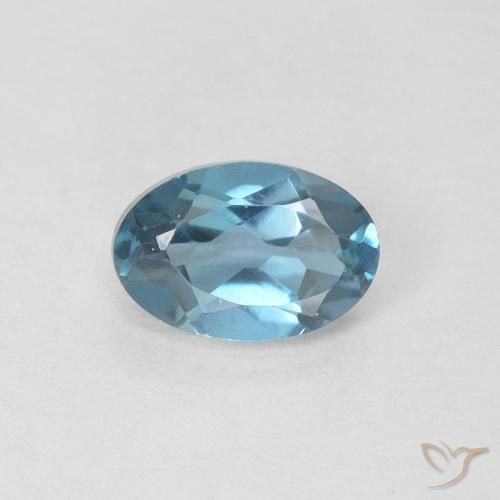 0.61ct Natural Azul Londres Topacio, Ovalada, VVS-VS