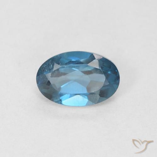 0.61ct Natural Azul Londres Topacio, Ovalada, VVS-VS