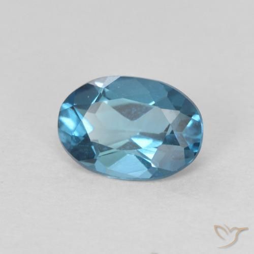 Topacio Azul Londres natural de 0.82 ct, Ovalada, VVS
