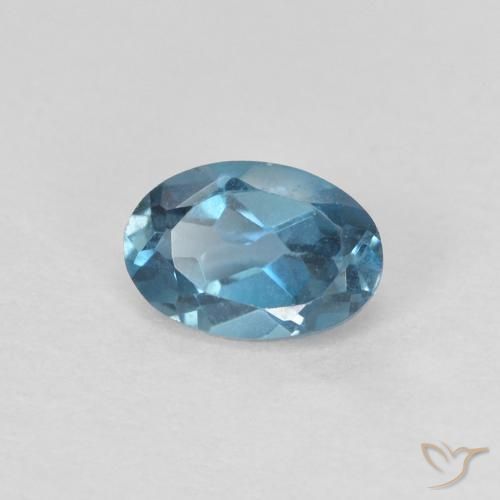 Topacio Azul Londres natural de 0.64 ct, Ovalada, VVS