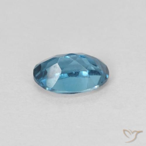 Topacio Azul Londres natural de 0.64 ct, Ovalada, VVS