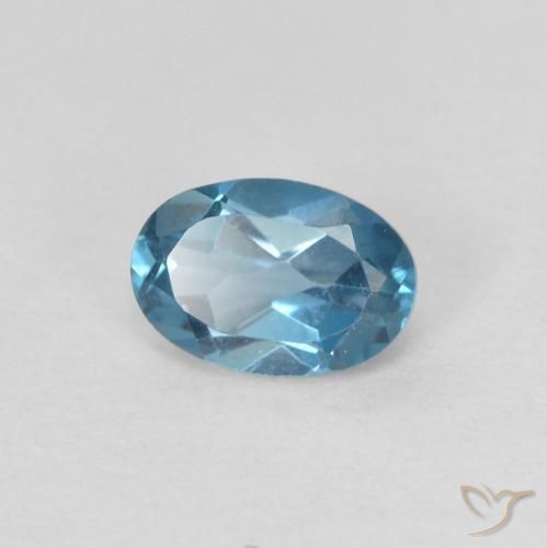 Topacio Azul Londres natural de 0.64 ct, Ovalada, VVS