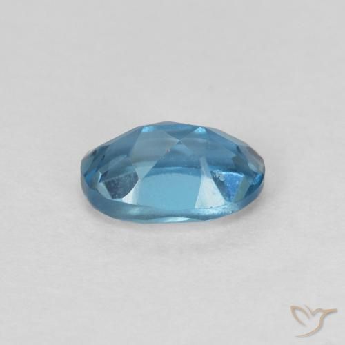 Topacio Azul Londres natural de 0.72 ct, Ovalada, VVS