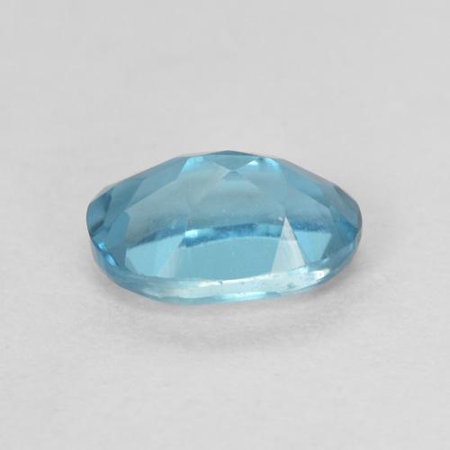 Topacio Azul Londres natural de 0.64 ct, Ovalada, VVS