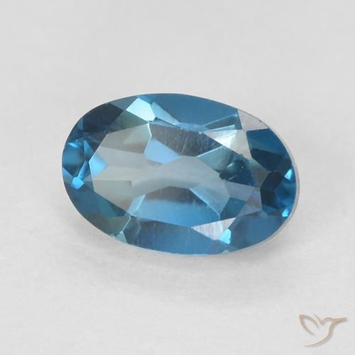 Topacio Azul Londres natural de 0.62 ct, Ovalada, VVS