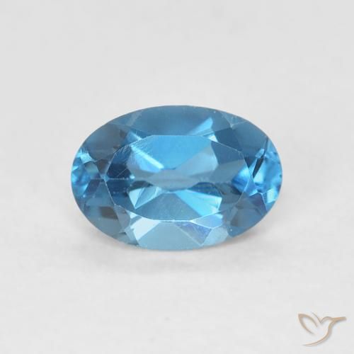 0.61ct Natural Azul Londres Topacio, Ovalada, VVS-VS