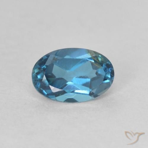 0.61ct Natural Azul Londres Topacio, Ovalada, VVS-VS