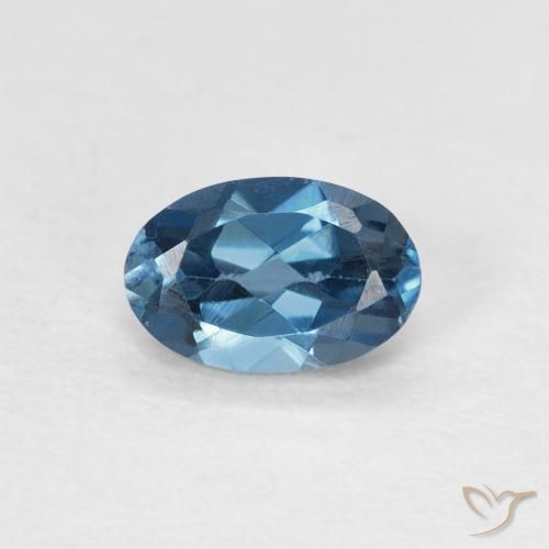 0.62ct Natural Azul Londres Topacio, Ovalada, VS