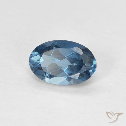 Topacio Azul Londres natural de 0.62 ct, Ovalada, VS