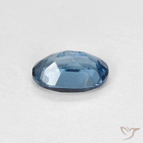 Topacio Azul Londres natural de 0.62 ct, Ovalada, VS