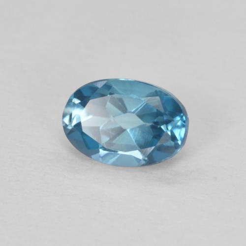 Topacio Azul Londres natural de 0.59 ct, Ovalada, VS