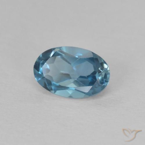 Topacio Azul Londres natural de 0.64 ct, Ovalada, VVS