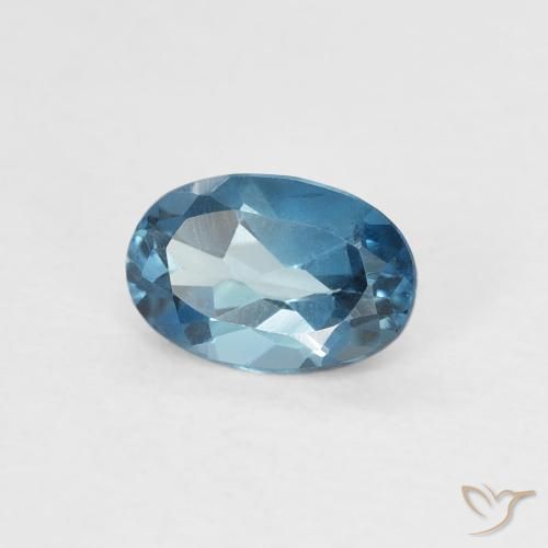 Topacio Azul Londres natural de 0.64 ct, Ovalada, VS