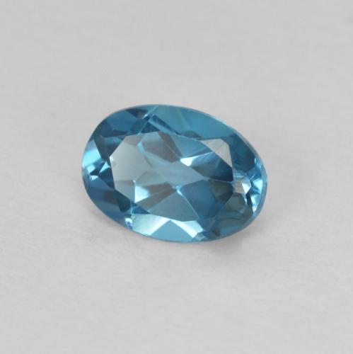 Topacio Azul Londres natural de 0.58 ct, Ovalada, VVS