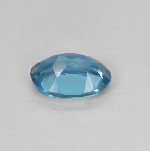 Topacio Azul Londres natural de 0.58 ct, Ovalada, VVS