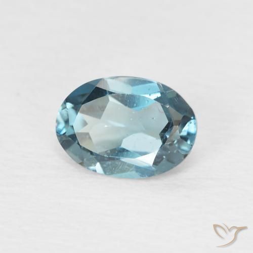 Topacio Azul Londres natural de 0.98 ct, Ovalada, VS