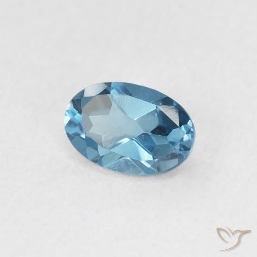 Topacio Azul Londres natural de 0.64 ct, Ovalada, VVS