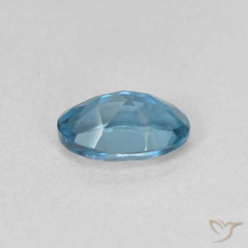 Topacio Azul Londres natural de 0.61 ct, Ovalada, VVS