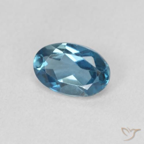 Topacio Azul Londres natural de 0.58 ct, Ovalada, VVS