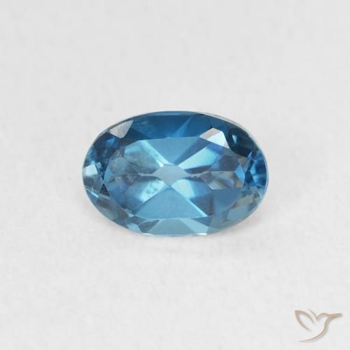 0.62ct Natural Azul Londres Topacio, Ovalada, VVS
