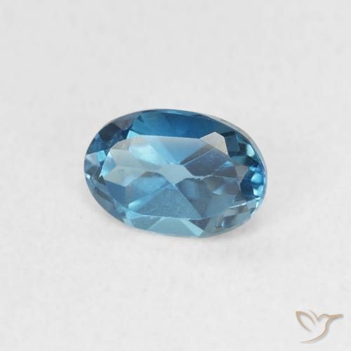 Topacio Azul Londres natural de 0.62 ct, Ovalada, VVS