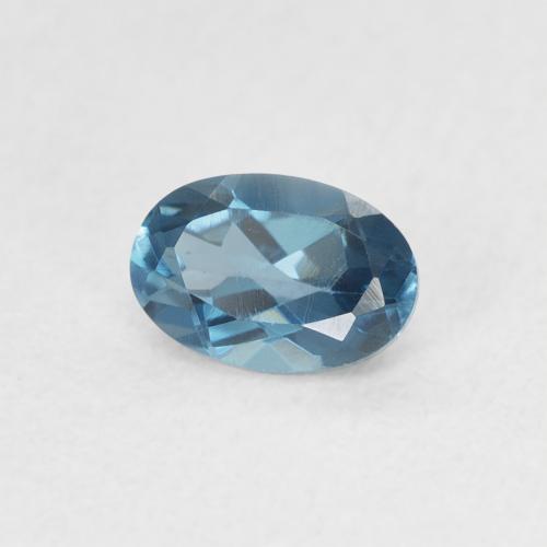 Topacio Azul Londres natural de 0.61 ct, Ovalada, VVS