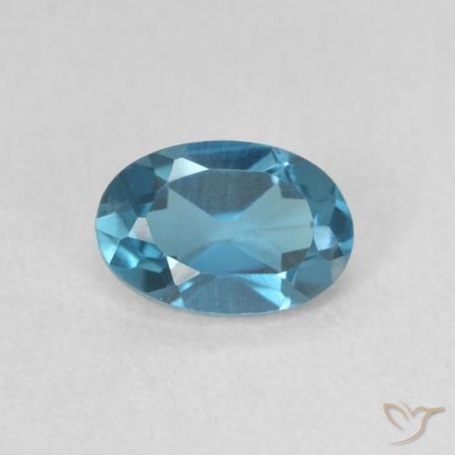 0.67ct Natural Azul Londres Topacio, Ovalada, VVS