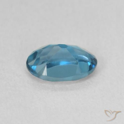 Topacio Azul Londres natural de 0.67 ct, Ovalada, VVS