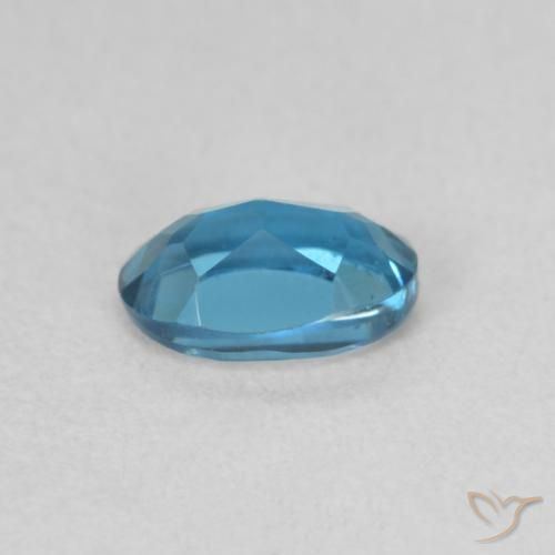 Topacio Azul Londres natural de 0.64 ct, Ovalada, VVS-VS