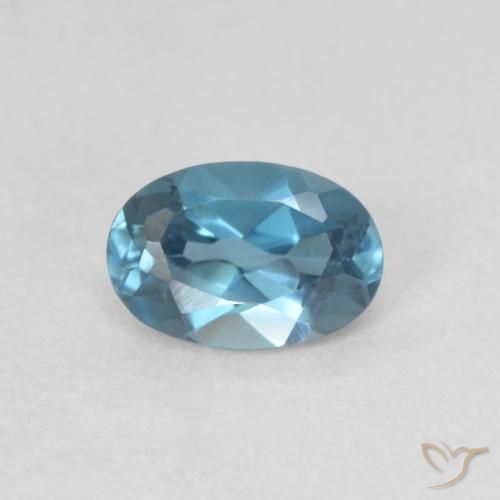 0.61ct Natural Azul Londres Topacio, Ovalada, VVS-VS