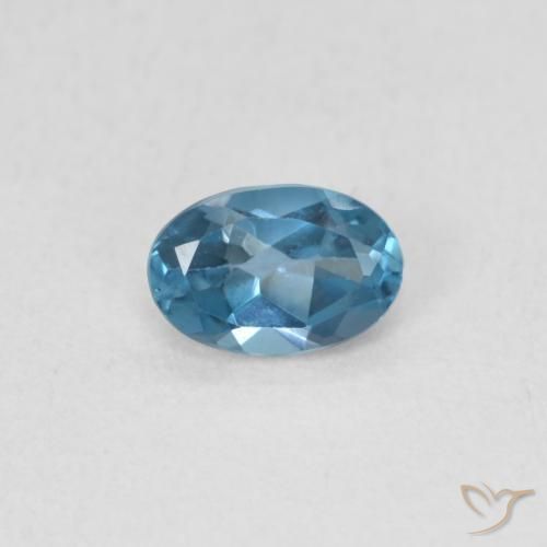0.56ct Natural Azul Londres Topacio, Ovalada, VS