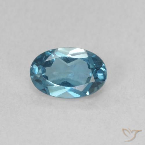 0.61ct Natural Azul Londres Topacio, Ovalada, VVS