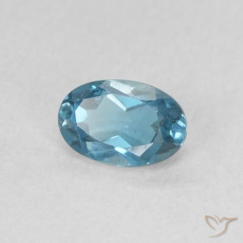 Topacio Azul Londres natural de 0.61 ct, Ovalada, VVS
